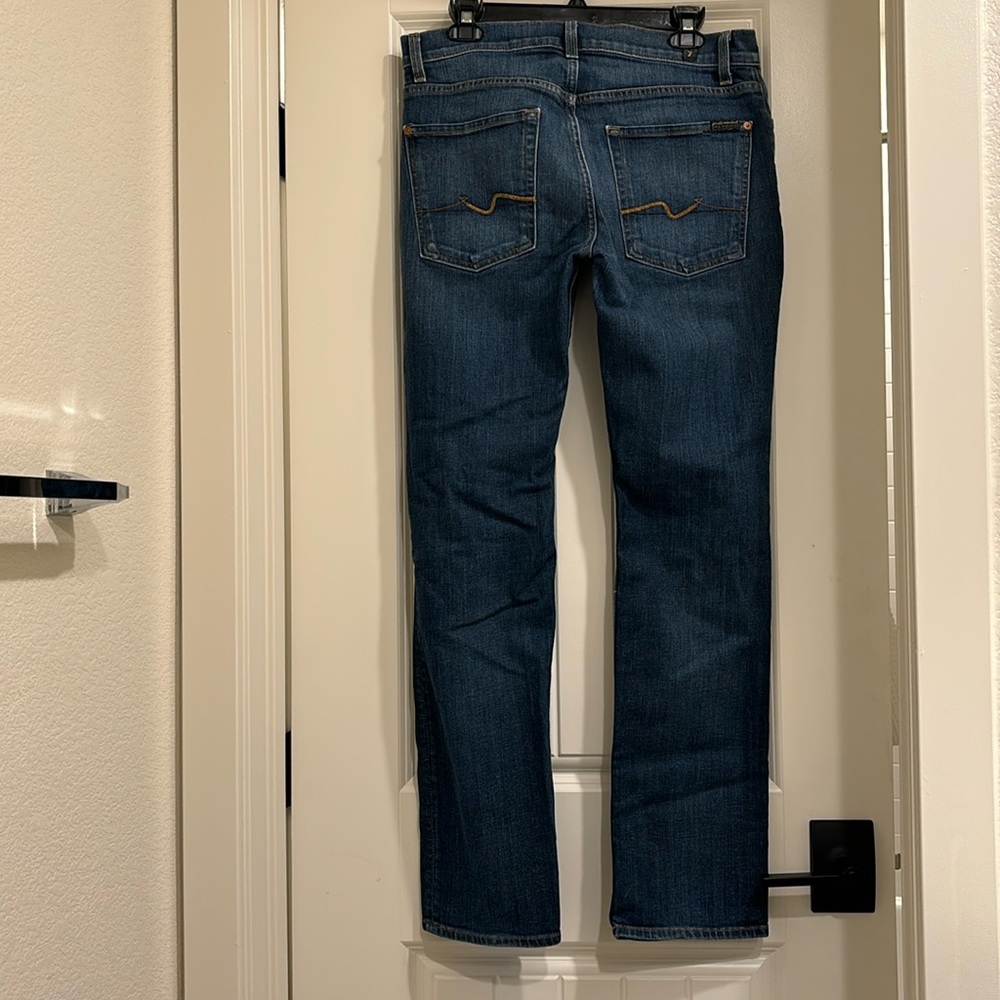 7 for all man kind ladies bootcut jeans. Size 31.